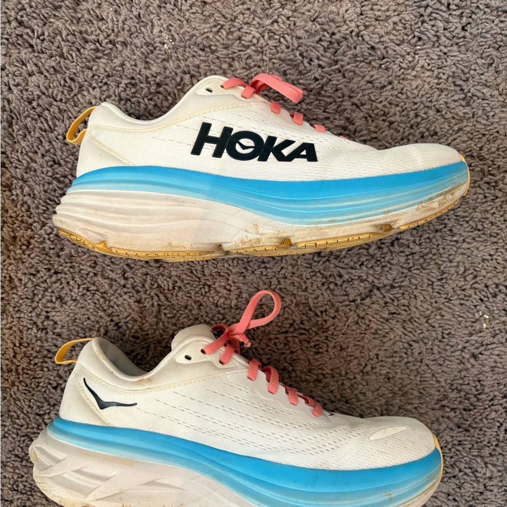 Hoka White Sneakers with Blue Midsole and Pink Laces